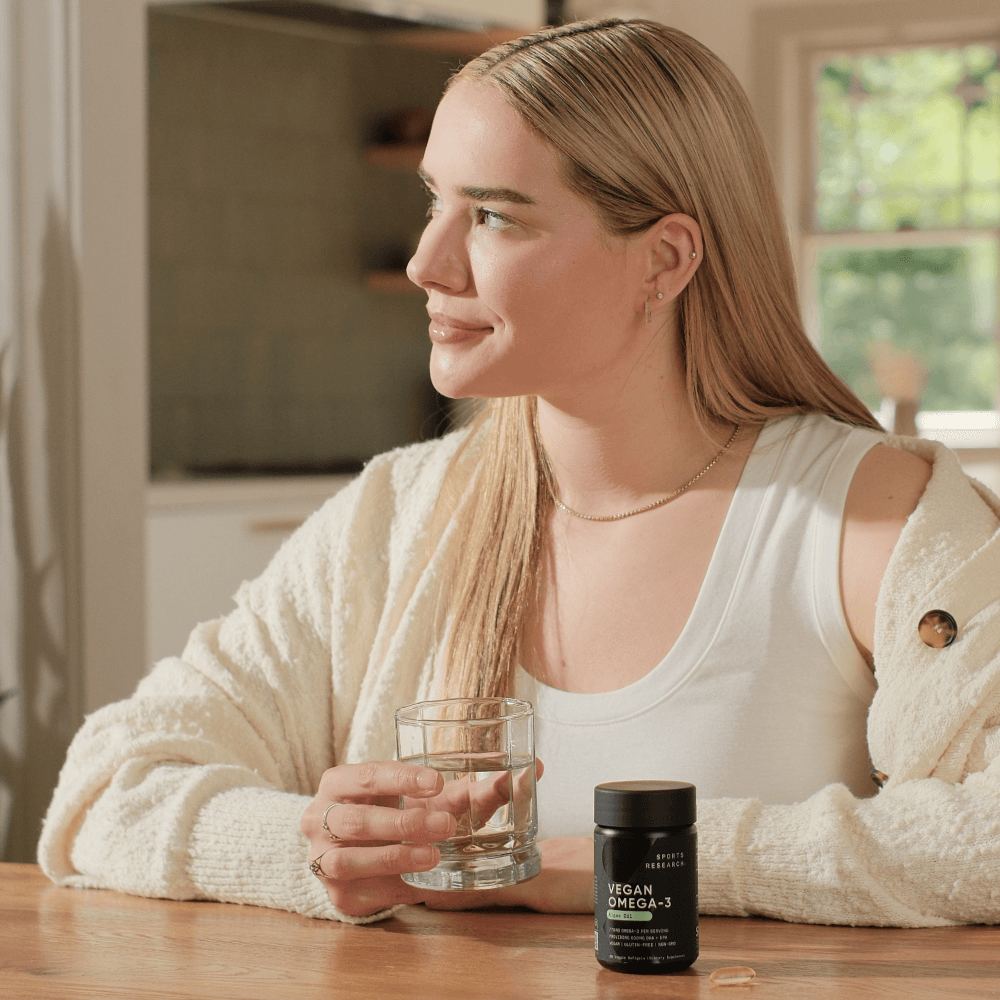 Lifestyle image of woman with vegan omega-3.