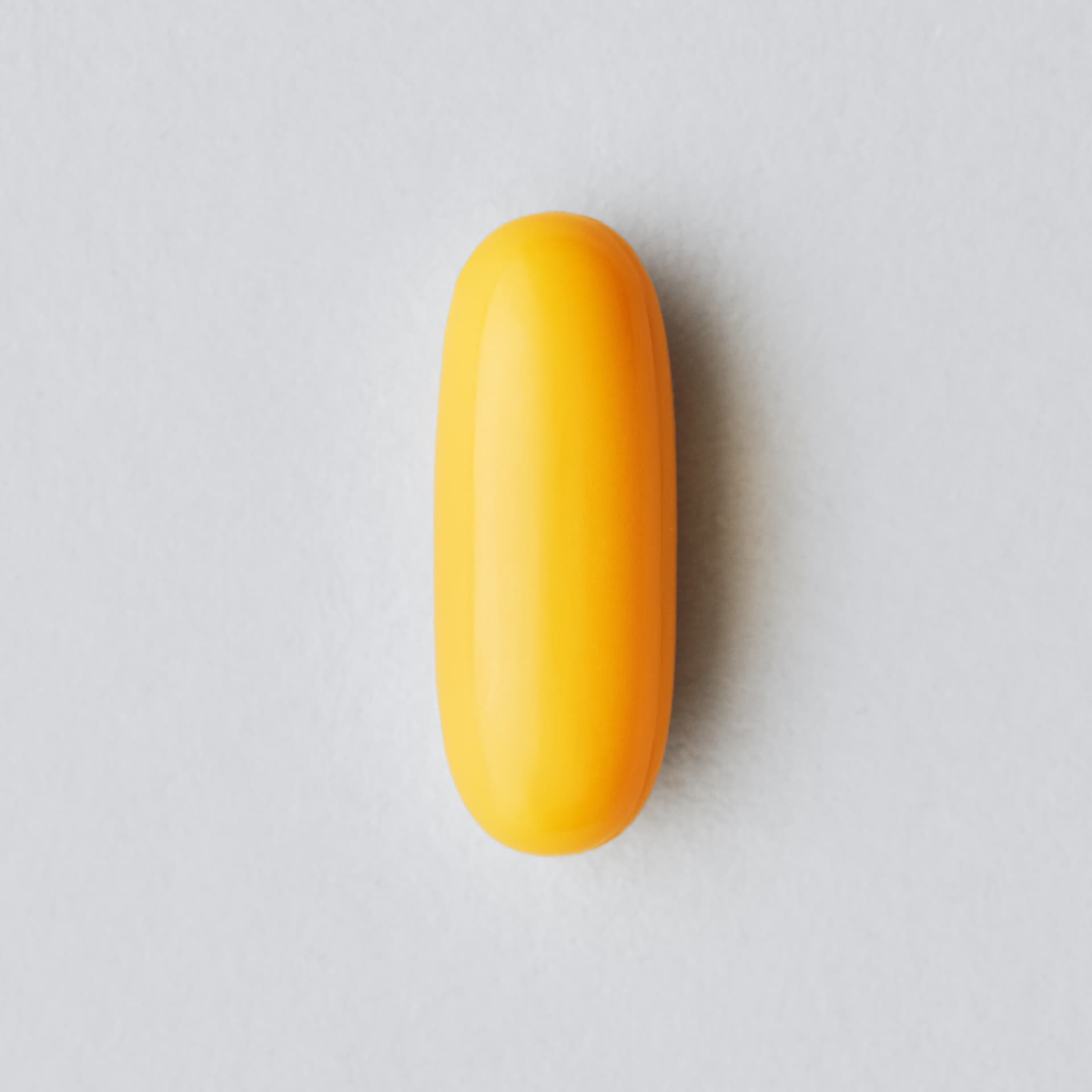 A single Sports Research L-Theanine + Caffeine softgel infographic.